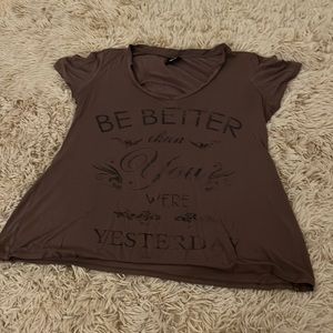 Brown V-neck that says (be better than you were yesterday)